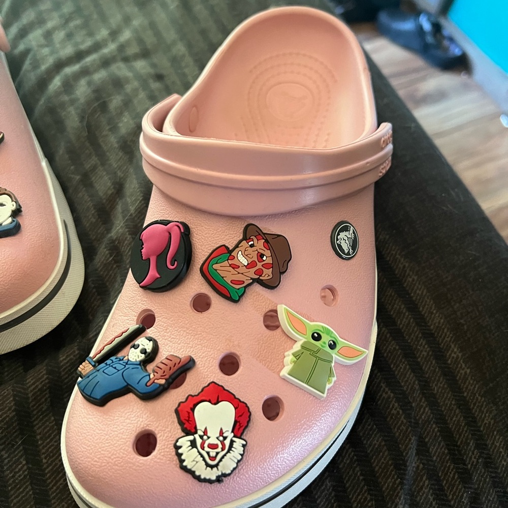 Barely worn crocs. Comes with charms you see